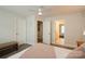 Bedroom featuring carpet, a bed, and access to other rooms in the home at 9514 Wheatfield Rd, Charlotte, NC 28277