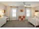 Charming bedroom with great natural light, ceiling fan, and neutral carpet at 9514 Wheatfield Rd, Charlotte, NC 28277