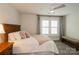 Bedroom featuring carpet, a queen bed, and natural light at 9514 Wheatfield Rd, Charlotte, NC 28277