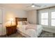 Bedroom featuring carpet, a queen bed, and natural light at 9514 Wheatfield Rd, Charlotte, NC 28277