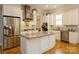 Modern kitchen features stainless steel appliances, granite countertops, and ample cabinet space at 9514 Wheatfield Rd, Charlotte, NC 28277