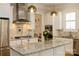 Stylish kitchen with stainless steel appliances, pendant lighting, and granite countertops at 9514 Wheatfield Rd, Charlotte, NC 28277