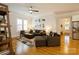 Open-concept living room features a fireplace, a large window, and comfortable seating at 9514 Wheatfield Rd, Charlotte, NC 28277