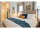Main bedroom with hardwood floors, big windows, and luxury comforter at 9514 Wheatfield Rd, Charlotte, NC 28277