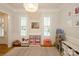 Bright playroom showcasing natural light, neutral walls, and organized toy storage at 9514 Wheatfield Rd, Charlotte, NC 28277