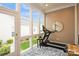 Cozy sun room with lots of natural light, and luxury vinyl floors at 9514 Wheatfield Rd, Charlotte, NC 28277