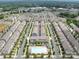 An aerial view of a large residential community with many townhomes and a pool for the residents at 9710 Ainslie Downs St, Charlotte, NC 28273