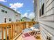 Relax on this inviting balcony with comfortable seating and a charming view of the neighborhood at 9710 Ainslie Downs St, Charlotte, NC 28273