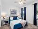 Cozy bedroom features a comfortable bed, neutral decor, and soft lighting, creating a relaxing atmosphere at 9710 Ainslie Downs St, Charlotte, NC 28273