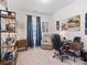 Well-appointed home office with a comfortable chair, desk, and natural light for a productive workspace at 9710 Ainslie Downs St, Charlotte, NC 28273