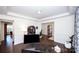 Stylish home office with wainscoting, hardwood floors, and ample natural light, creating a comfortable workspace at 9878 Verdun Ct, Fort Mill, SC 29707