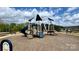 Blue playground with climbing structures, slides, and benches, perfect for community fun and recreation at 9878 Verdun Ct, Fort Mill, SC 29707