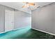 Grey bedroom with one window and closet at 109 Windmill Rd, Salisbury, NC 28147