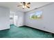 A light blue bedroom with lots of light and ceiling fan at 109 Windmill Rd, Salisbury, NC 28147