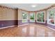Inviting living room boasts natural light through large bay windows, showcasing the home's charm at 109 Windmill Rd, Salisbury, NC 28147