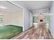Open living room with hardwood floors and a brick fireplace at 109 Windmill Rd, Salisbury, NC 28147