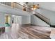 Open living area with staircase, hardwood floors and high ceiling at 109 Windmill Rd, Salisbury, NC 28147