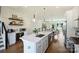 Beautiful kitchen with center island, pendant lighting, stainless steel appliances, and an open floor plan at 1105 Reece Rd, Charlotte, NC 28209