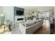 Spacious living room and dining area with open layout, fireplace, and modern décor at 1105 Reece Rd, Charlotte, NC 28209