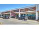 Various retail stores including Caribou Coffee and Bruegger's Bagels in a shopping center at 1105 Reece Rd, Charlotte, NC 28209