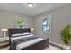 Calm bedroom with two windows and a plush bed at 111 Quinn Ave, Gastonia, NC 28054