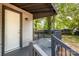 Cozy covered porch welcomes you with its charming details and protective railing at 111 Quinn Ave, Gastonia, NC 28054