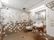 Bathroom featuring a walk-in shower, grab bars, sink, and mirror in a tiled room with safety features at 1113 Gregory Ln, Statesville, NC 28677