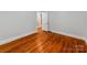 Bright bedroom with hardwood floors and neutral walls at 1113 Gregory Ln, Statesville, NC 28677