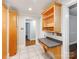 The kitchen features a built-in desk area and tile flooring at 1113 Gregory Ln, Statesville, NC 28677