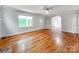 Spacious living room with hardwood floors and views into adjacent rooms at 1113 Gregory Ln, Statesville, NC 28677