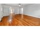 Living room with hardwood floors and a seamless layout offers a welcoming space at 1113 Gregory Ln, Statesville, NC 28677