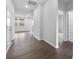 Well lit hallway boasts beautiful, modern, neutral tones and hardwood flooring throughout at 1125 Hallman Branch Ln, Lincolnton, NC 28092