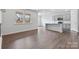 Open floor plan featuring kitchen, dining, and living space with natural light at 1125 Hallman Branch Ln, Lincolnton, NC 28092
