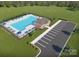 Aerial view of the community pool with lounge chairs, a clubhouse, and parking area at 1125 Hallman Branch Ln, Lincolnton, NC 28092