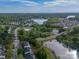 Breathtaking aerial view of a community surrounded by lush greenery and a serene lake at 117 Middleton Pl, Mooresville, NC 28117