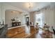 Inviting living room with hardwood floors, decorative lighting, and a cozy seating arrangement at 117 Middleton Pl, Mooresville, NC 28117
