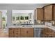 Well-appointed kitchen with stainless steel appliances, stone countertops, and modern cabinets, perfect for cooking at 130 Fordham Ct # 18, Fort Mill, SC 29715
