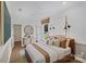 Serene main bedroom featuring hardwood floors, neutral tones, stylish lighting, and a well-placed window at 130 Fordham Ct # 18, Fort Mill, SC 29715