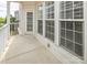 Spacious balcony with large windows, offering outdoor living at 14849 Santa Lucia Dr, Charlotte, NC 28277