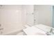 Clean, all-white bathroom with shower and modern fixtures at 14849 Santa Lucia Dr, Charlotte, NC 28277