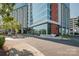 View of building's exterior with glass windows and landscaping at 14849 Santa Lucia Dr, Charlotte, NC 28277