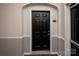 Apartment entrance with a black door featuring traditional hardware and visible unit number at 14849 Santa Lucia Dr, Charlotte, NC 28277