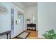 Bright foyer features hardwood floors, natural light, and stylish decorative accents at 15236 Waterfront Dr, Huntersville, NC 28078
