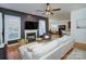 Spacious living room features a fireplace, hardwood floors, and open layout at 15236 Waterfront Dr, Huntersville, NC 28078