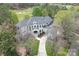 Beautiful aerial view of home with lush landscaping and golf course in background at 15603 Mccullers Ct, Charlotte, NC 28277
