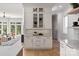 Stylish kitchen with display cabinets, drawers and modern decor at 15603 Mccullers Ct, Charlotte, NC 28277