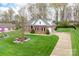 Spacious single-Gathering home with three-car garage and manicured lawn at 158 Canopy Oak Ln, Statesville, NC 28625