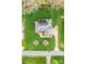 Aerial view of a beautiful home on a large lot with a well-manicured lawn at 158 Canopy Oak Ln, Statesville, NC 28625