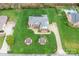 Expansive backyard and classic brick facade are the hallmarks of this residence at 158 Canopy Oak Ln, Statesville, NC 28625