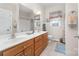 Bathroom with double sink vanity, tile floor, separate toilet room and combined tub and shower at 158 Canopy Oak Ln, Statesville, NC 28625